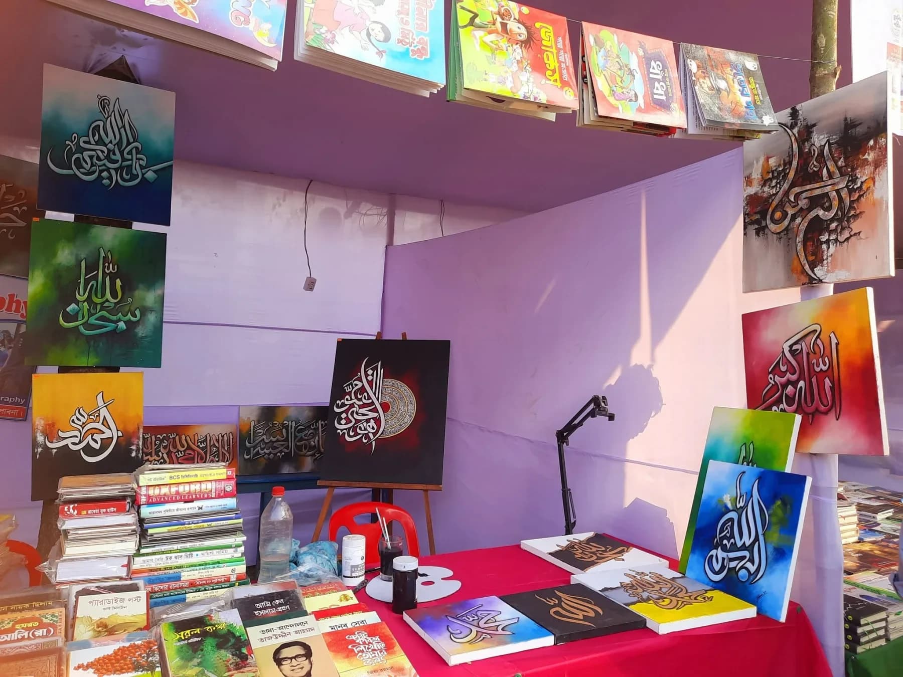 Paintings at an art fair stall
