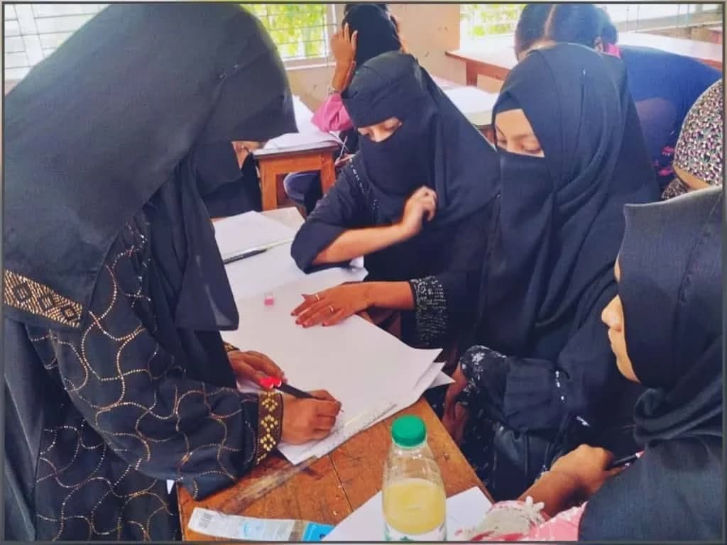 Students at a calligraphy class