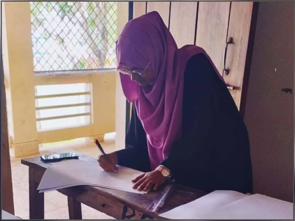 A student practising calligraphy