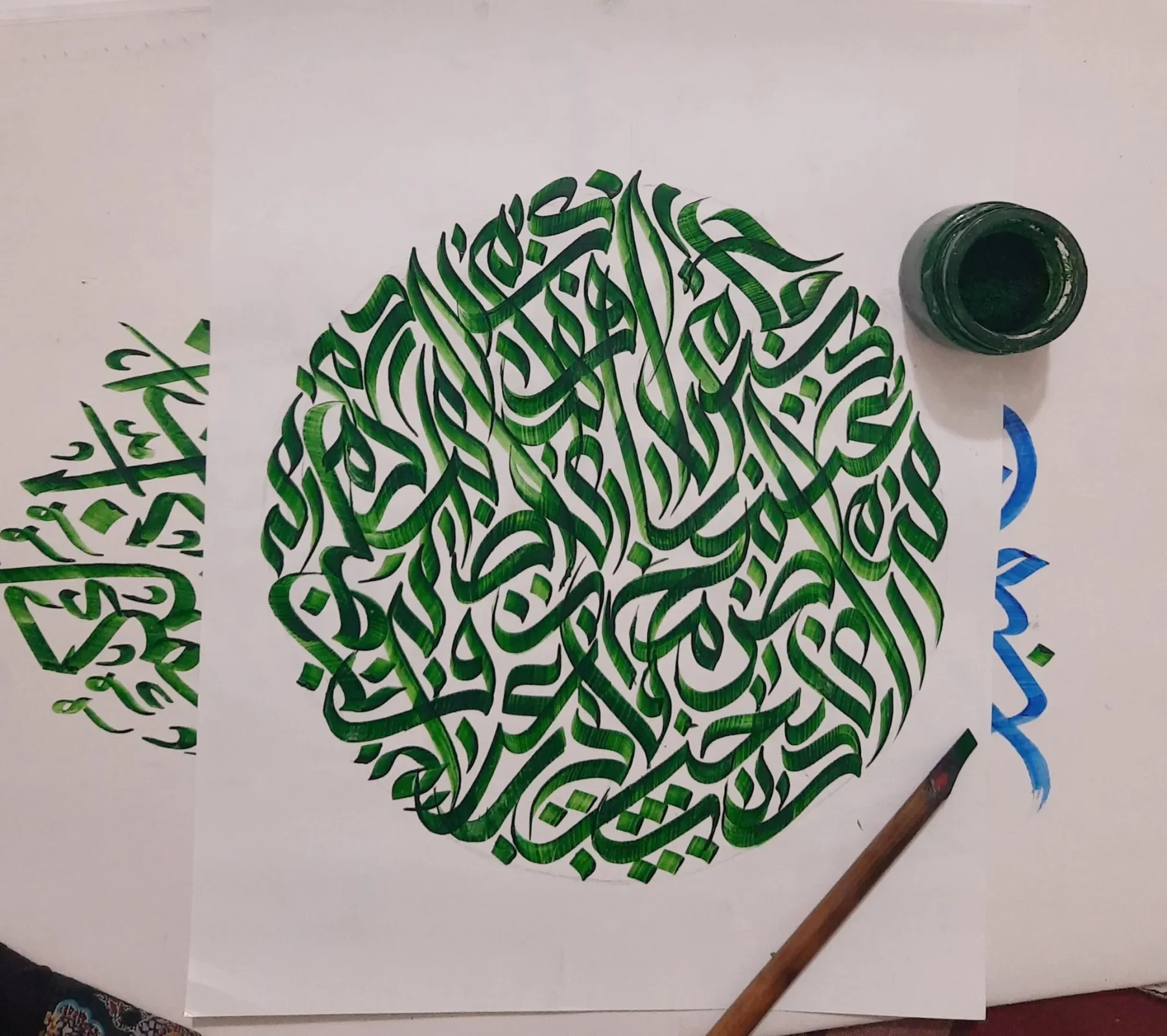 Circular ink calligraphy study in green